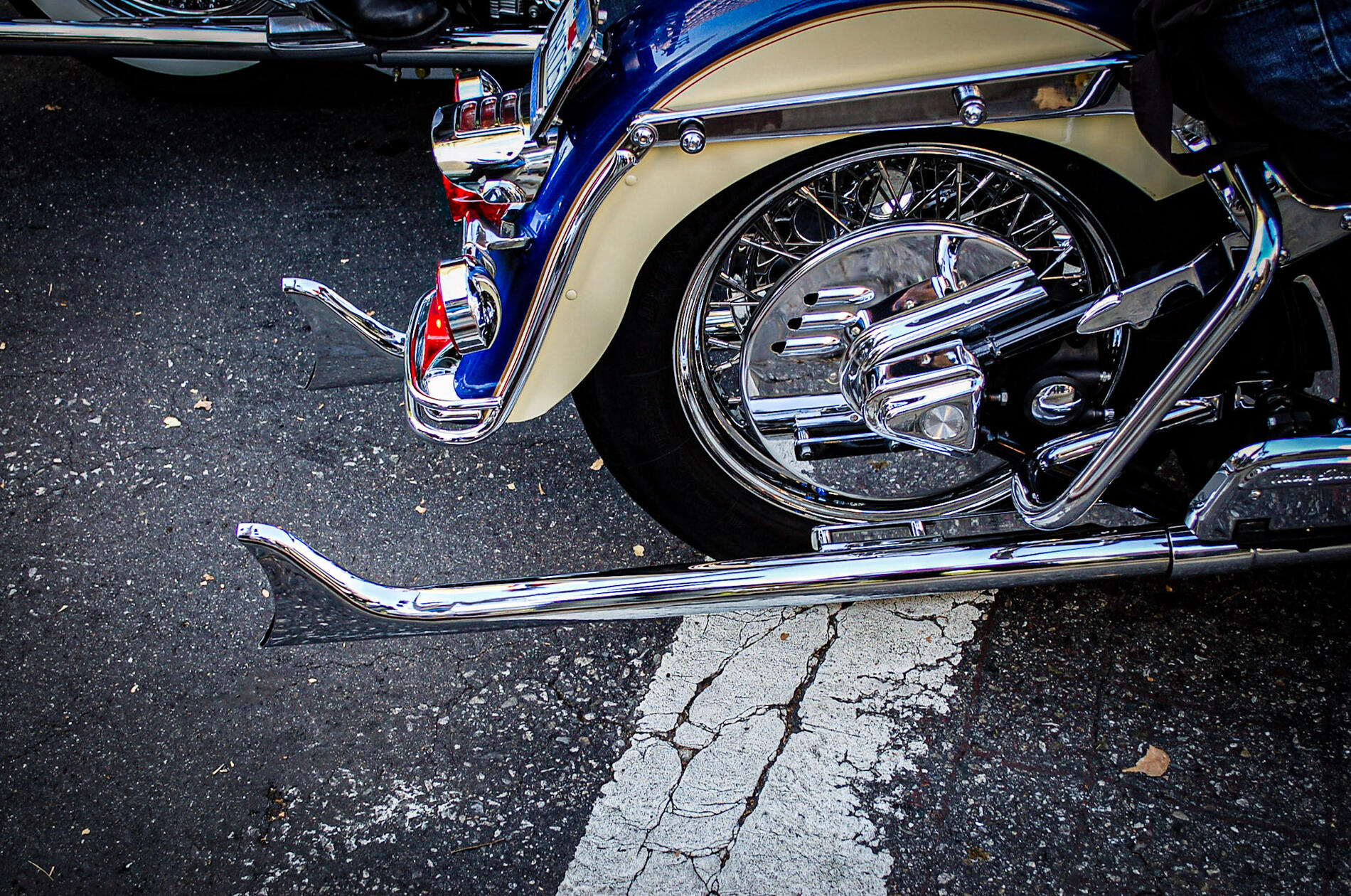 Close-Up Motorcycle Photography Featuring Chrome Detailing and Classic Cruiser Design on Urban Asphalt