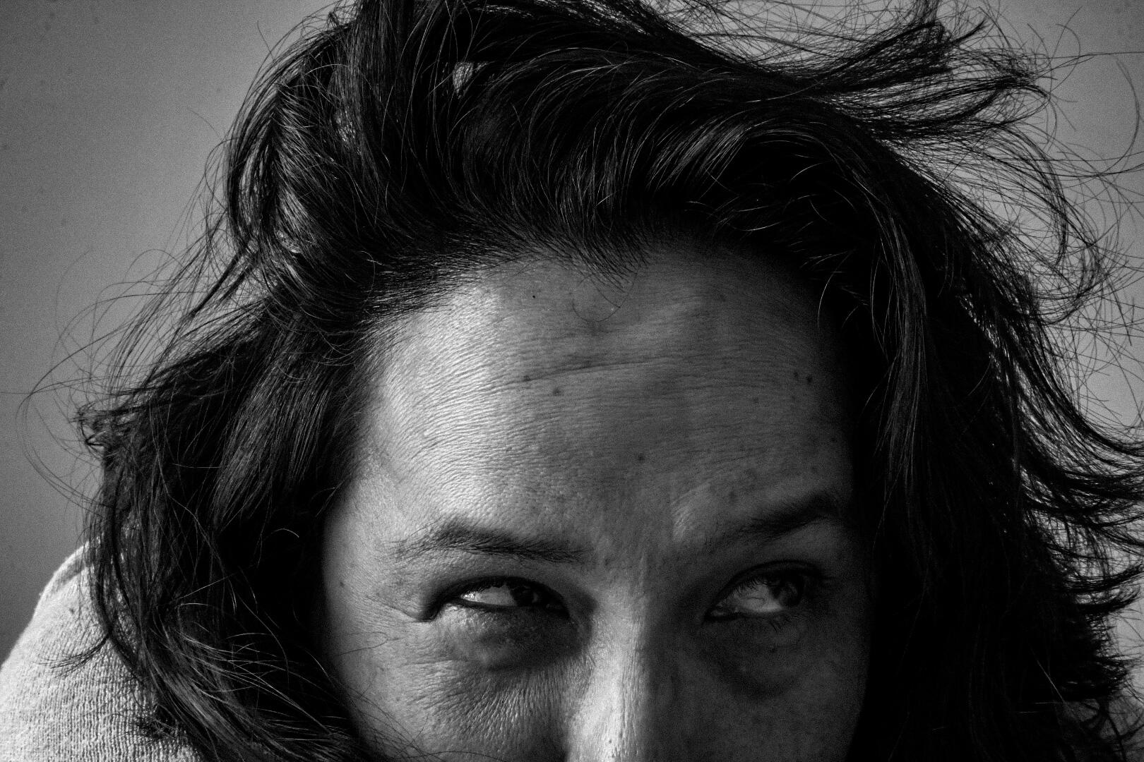 Expressive Black and White Portrait Photography Capturing Raw Emotion and Natural Texture in Close-Up Detail